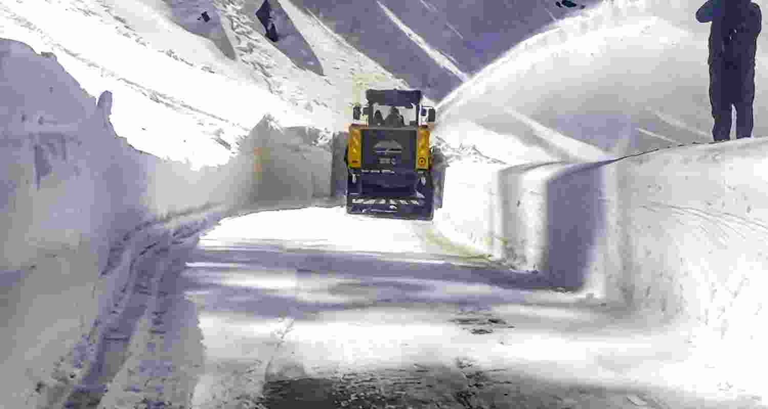 A snow-cutter blower clears snow on the Bhaderwah-Pathankot road, in Doda district, Jammu and Kashmir, Saturday, March 28, 2026.