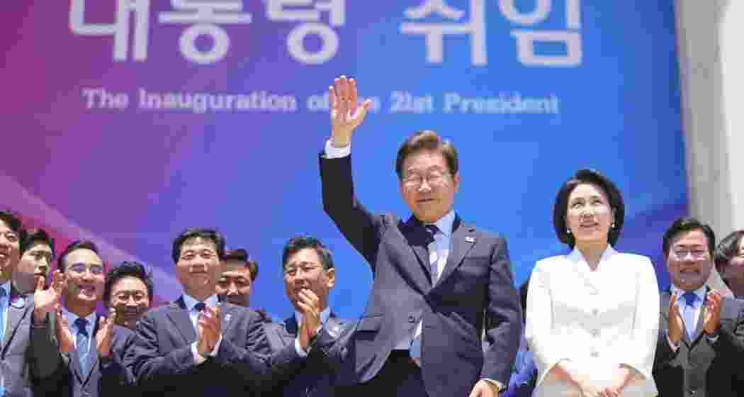 South Korean President Lee Jae-myung waves after his inauguration ceremony at the National Assembly in Seoul on Wednesday. He vowed to pursue dialogue with North Korea and deepen ties with the US and Japan.
