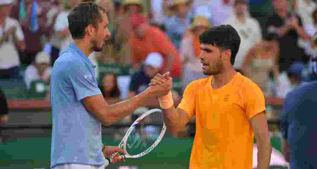 Daniil Medvedev and Carlos Alcaraz.