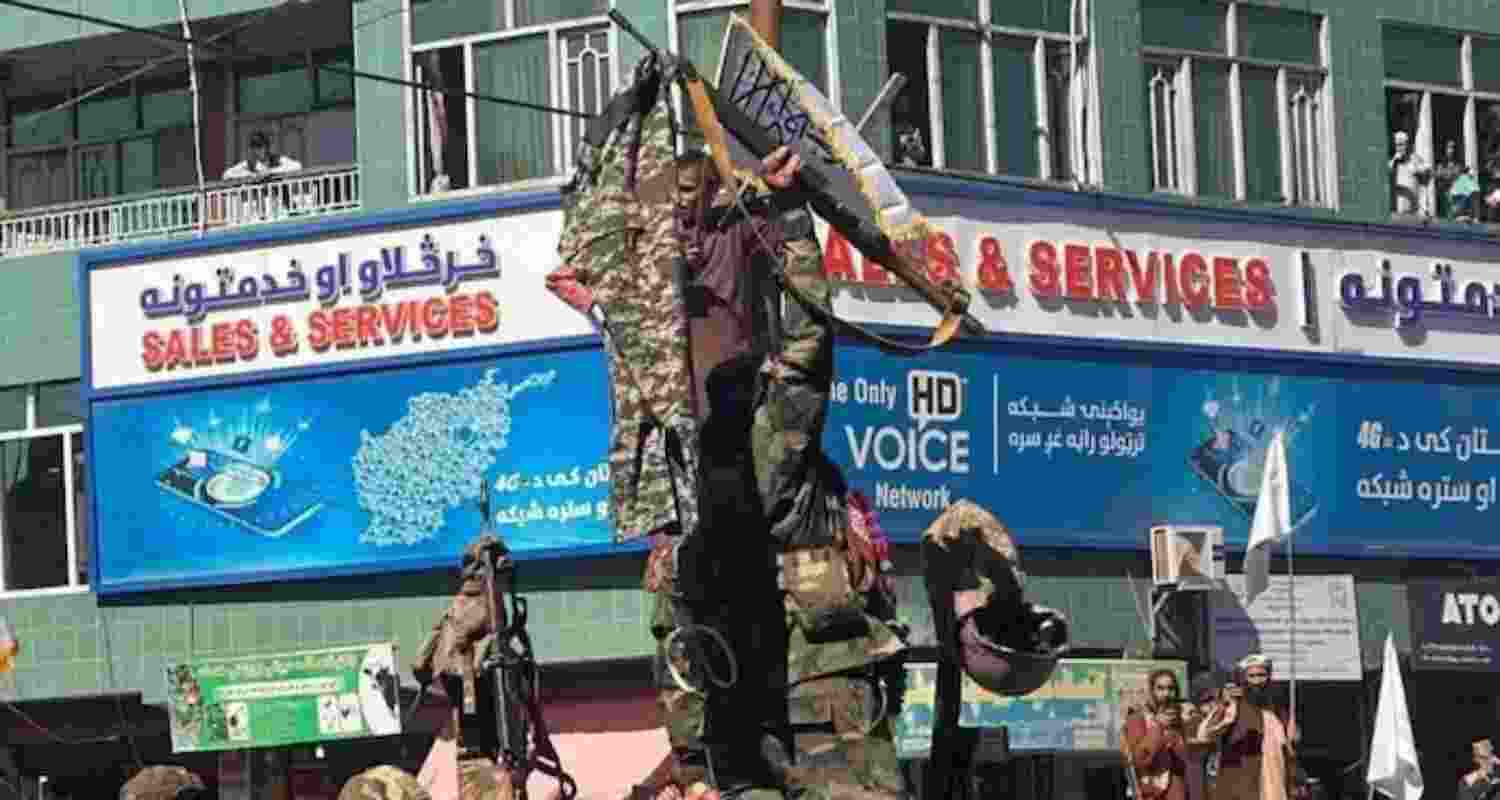 Taliban hangs trousers and weapons of captured Pakistani troops at multiple places.