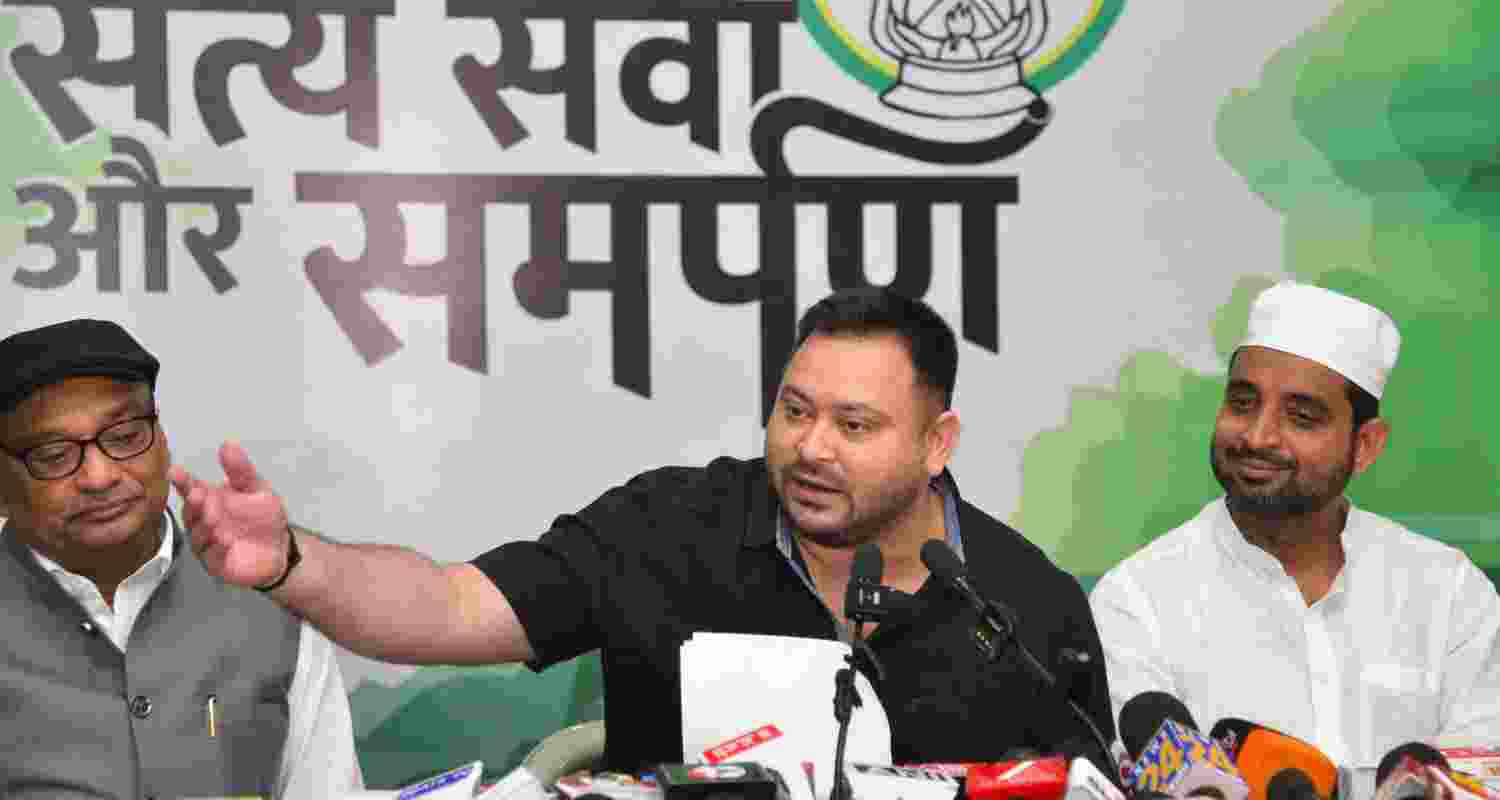 LoP in the Bihar Assembly and RJD leader Tejashwi Yadav addresses a press conference, in Patna, Sunday.