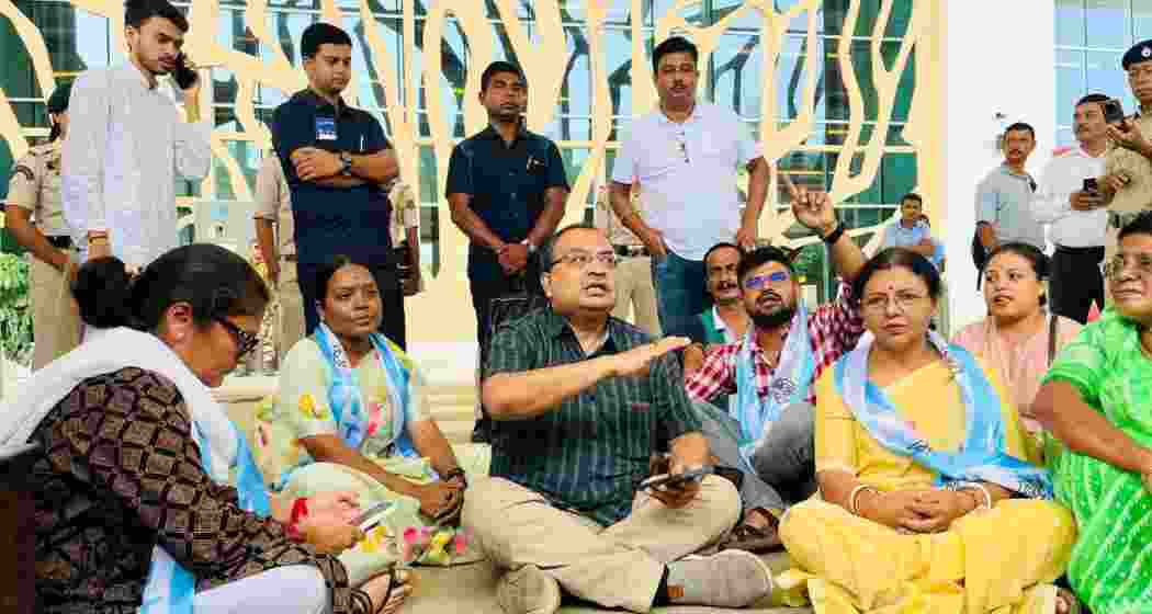 TMC leaders, including Kunal Ghosh, stage protest at Tripura airport on Wednesday.