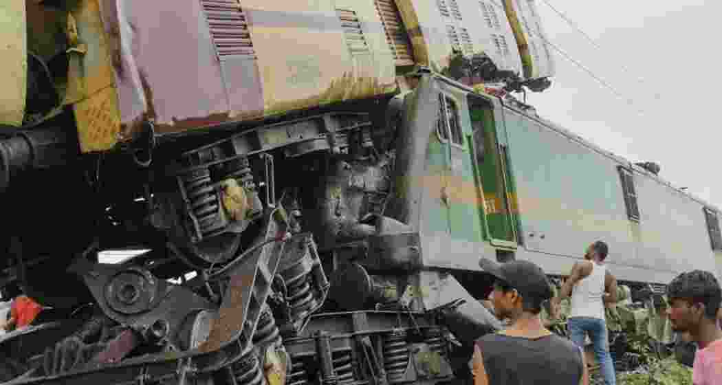 Mangled remains of the Kanchanjungha Express and a goods train after a collision between them, near Rangapani railway station, on Monday, June 17, 2024. At least 15 people were killed and 60 others suffered injuries, according to officials.