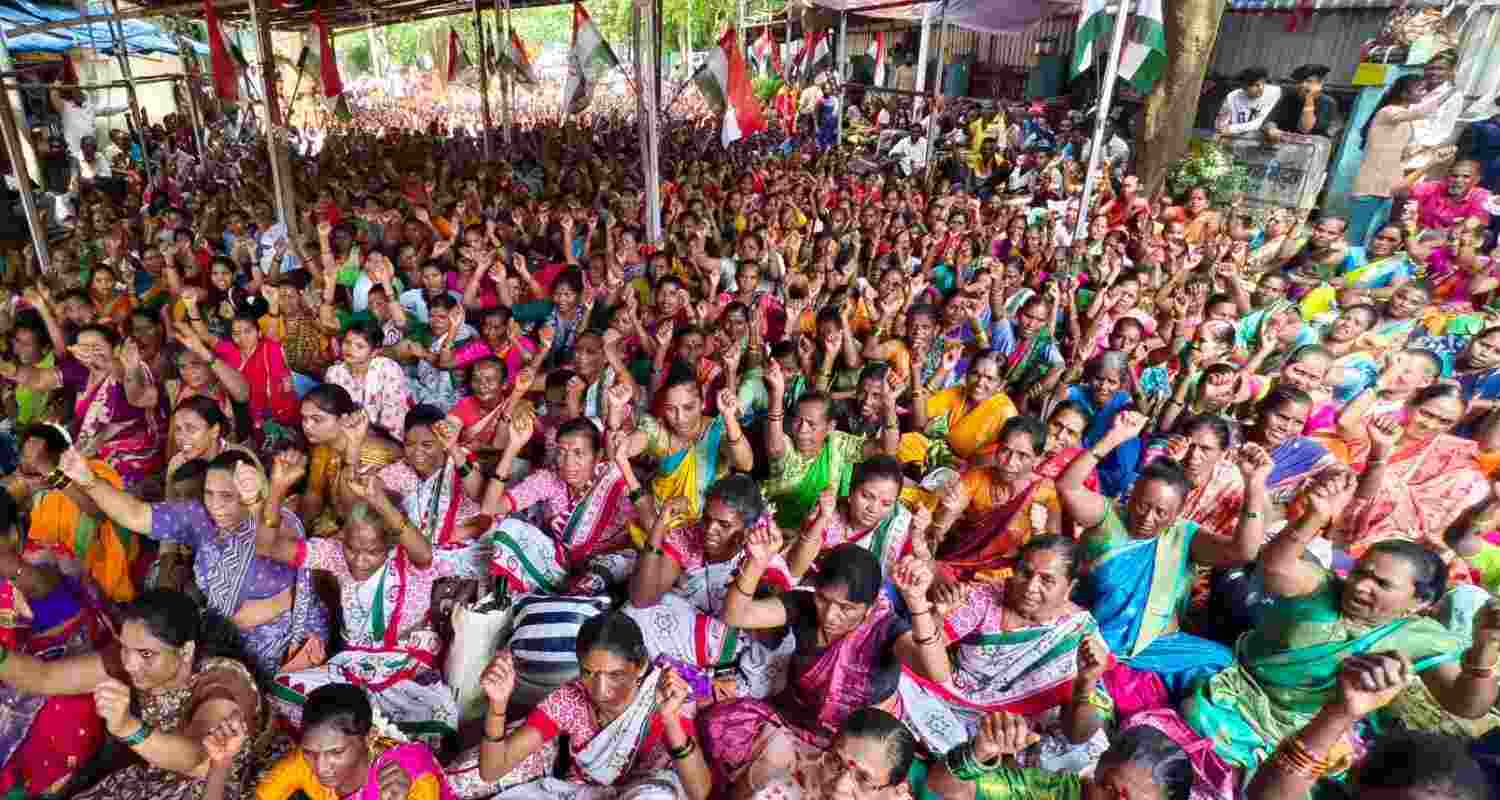 Tribals protest at Thane Collector office, demanding transfer of forest lands to them, in Thane, Friday, Sept. 20.