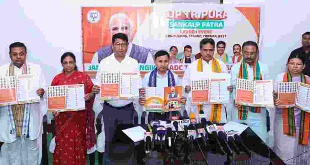 Chief Minister Dr Manik Saha unveils BJP’s 29-point Sankalp Patra at TTAADC headquarters in Khumulwng on Sunday, accompanied by senior party leaders, ahead of the upcoming elections.