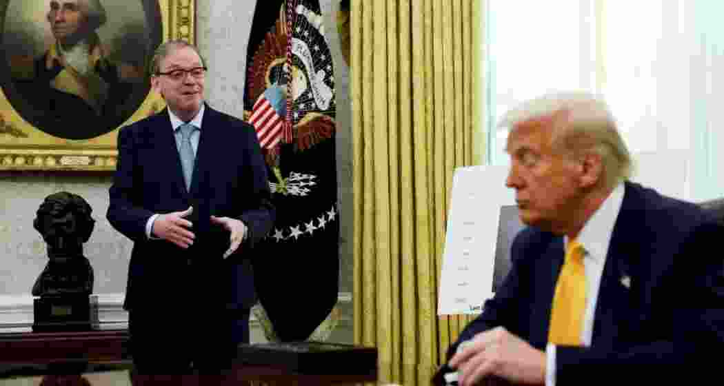 Trump adviser Kevin Hassett with US President Donald Trump at the White House in Washington. 
