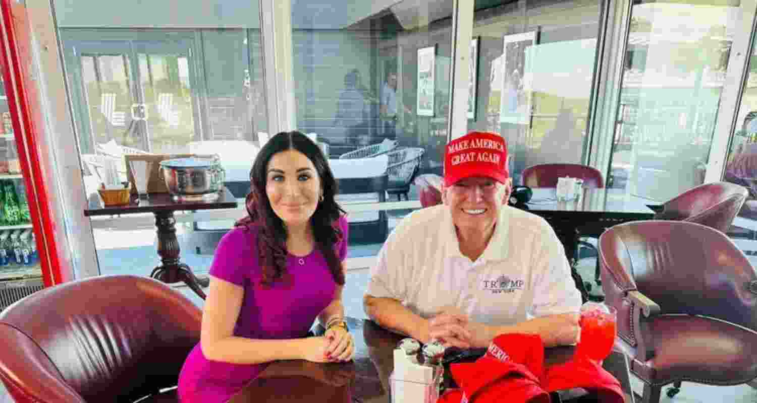 Donald Trump with Laura Loomer. 