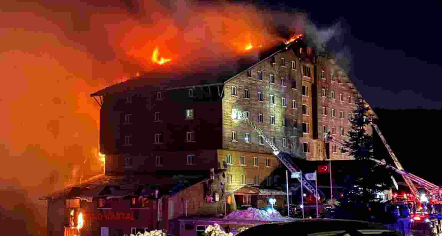 Flames rise from the Grand Kartal hotel. Image via X.