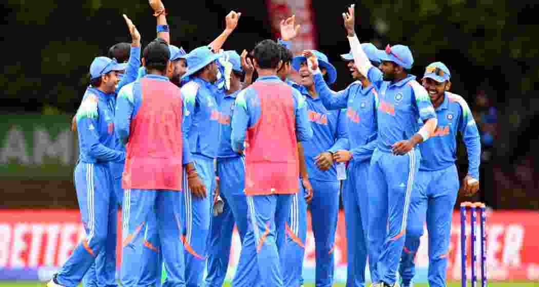 Indian Under-19 players share a light moment and take a break after a dismissal during their World Cup semi-final against Afghanistan at Harare Sports Club on 4 February 2026. (PC: BCCI)
