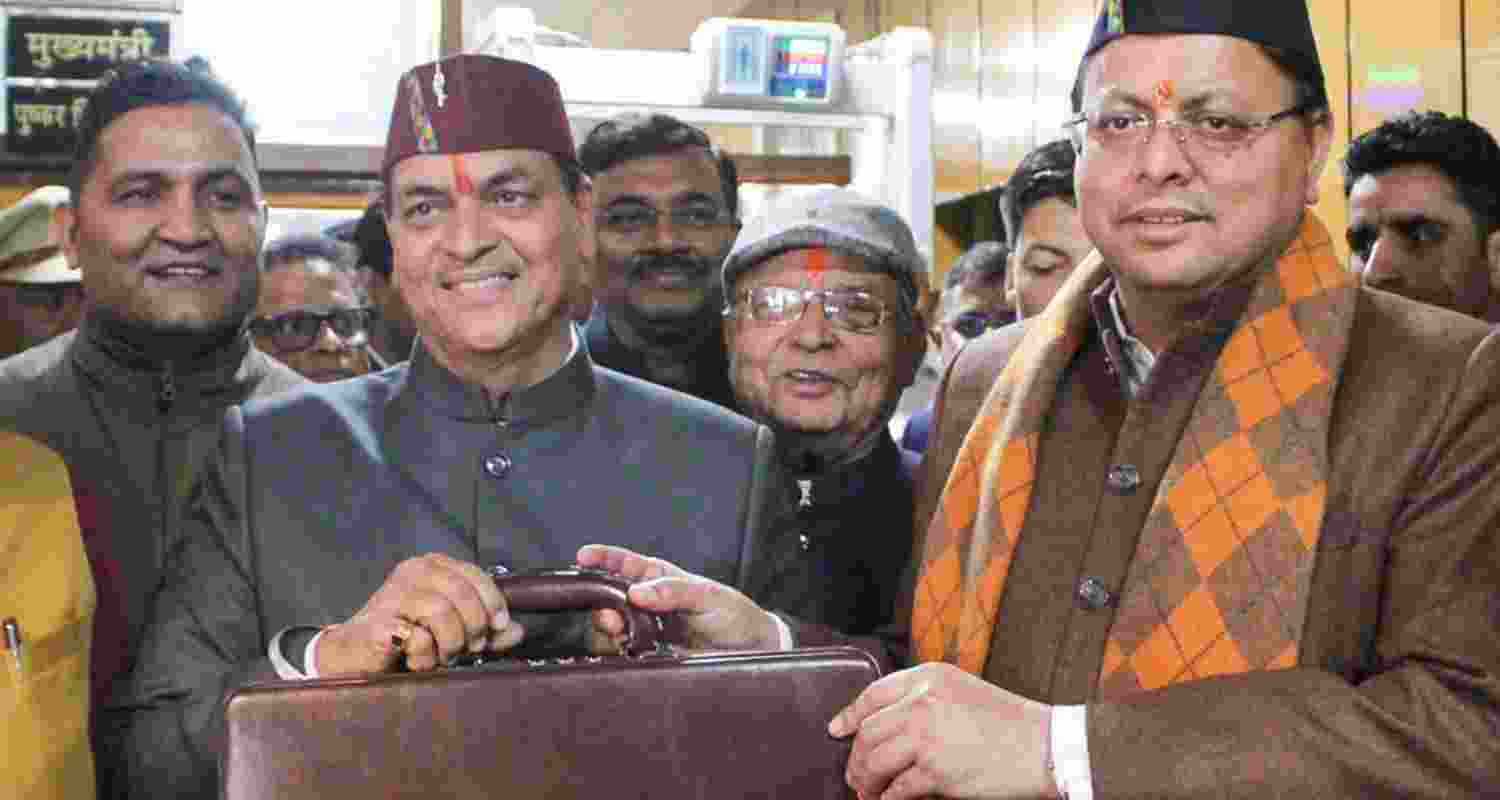  Uttarakhand Chief Minister Pushkar Singh Dhami and Finance Minister Prem Chand Aggarwal before presentation of the State Budget 2025-26 in the Assembly, in Dehradun, Thursday. 