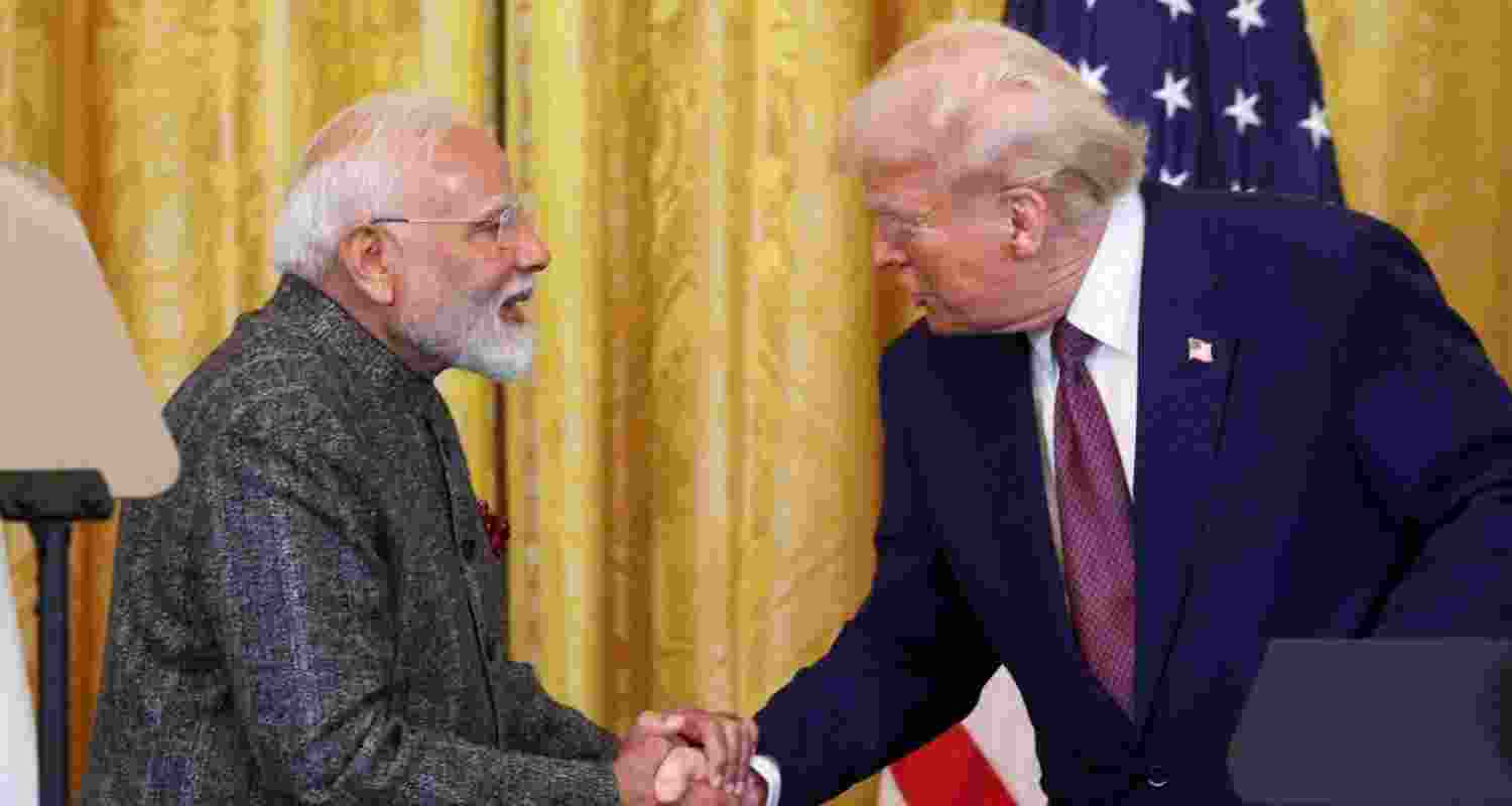 An older image of India's Prime Minister Narendra Modi with US President Donald Trump