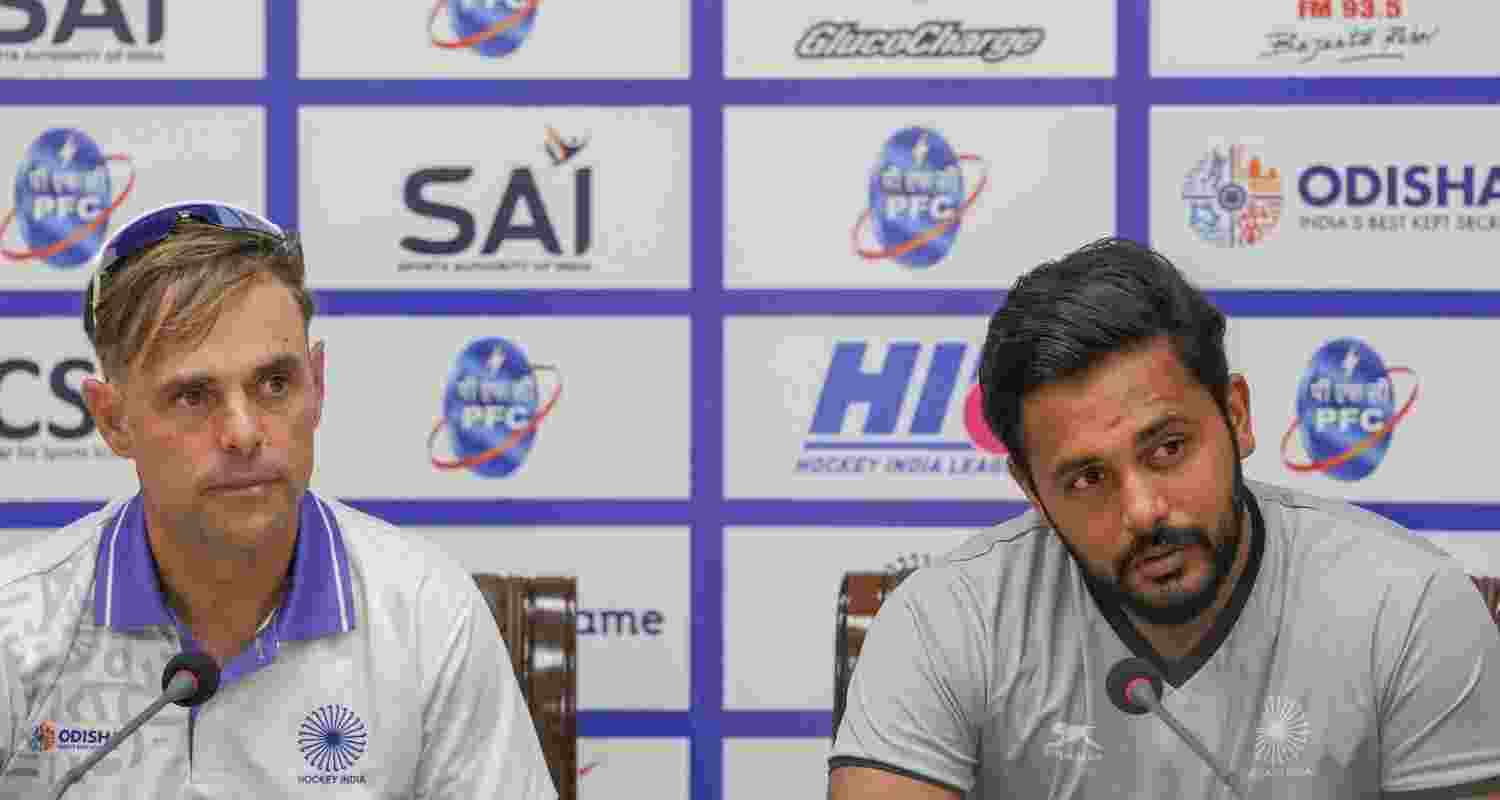 Indian men's hockey team captain Harmanpreet Singh and with coach Craig Fulton during a press conference ahead of the two-match series against Germany, at Major Dhyan Chand National Stadium, in New Delhi, Tuesday, Oct. 22, 2024. 