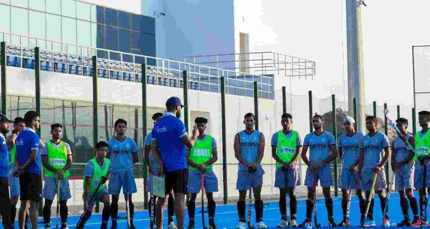 India Junior Men's hockey team with coach PR Sreejesh. 