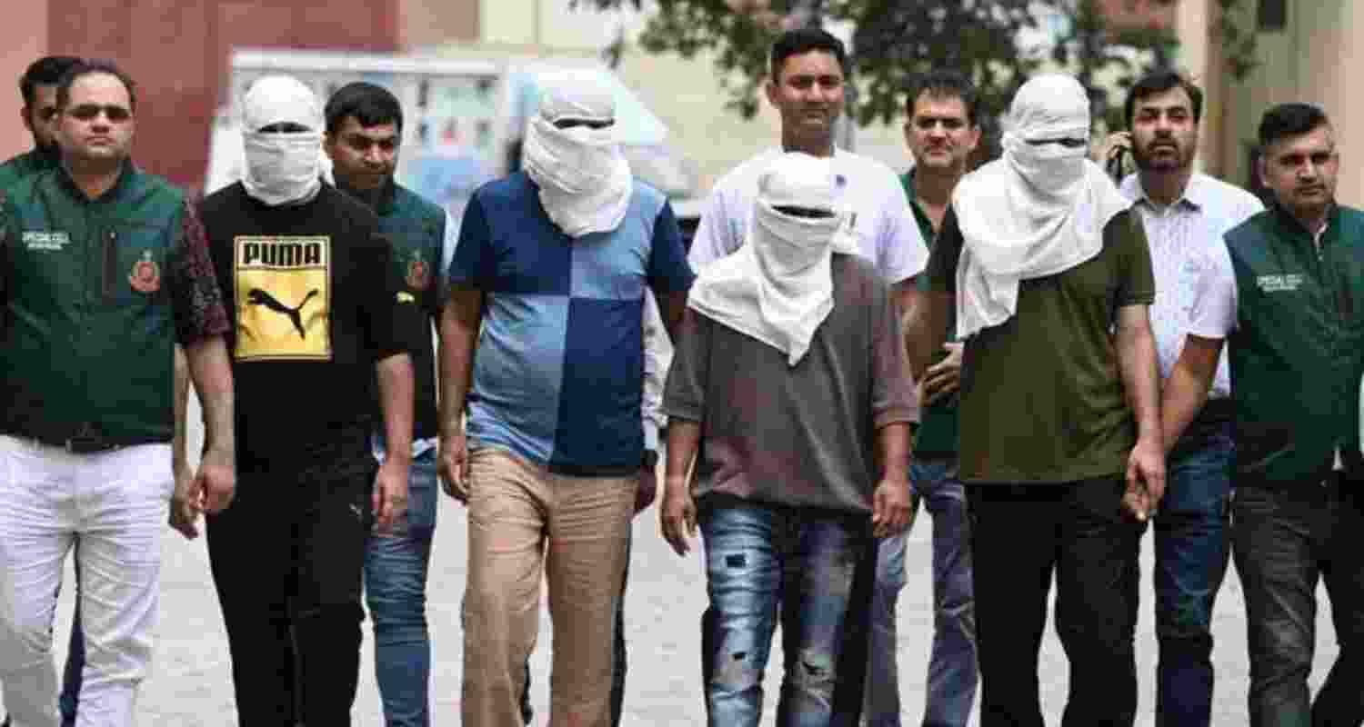 Cyber gang held woman hostage via video calls.