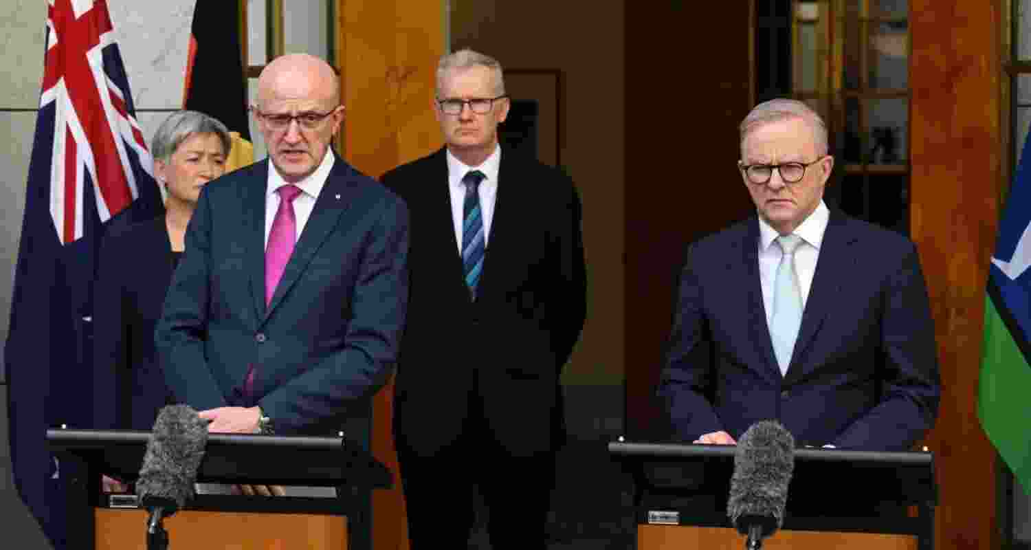 Australia expels Iranian envoy over arson attack links.