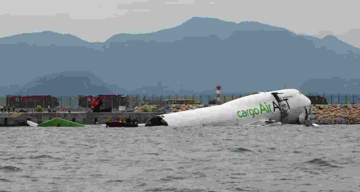 Boeing 747 Cargo Plane Skids Off Hong Kong Runway.
