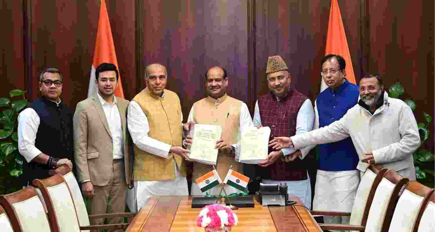 Jagdambika Pal leads submission of Waqf Bill report to Lok Sabha speaker despite opposition objections. Jagdambika Pal leads submission of Waqf Bill report to Lok Sabha speaker despite opposition objections.