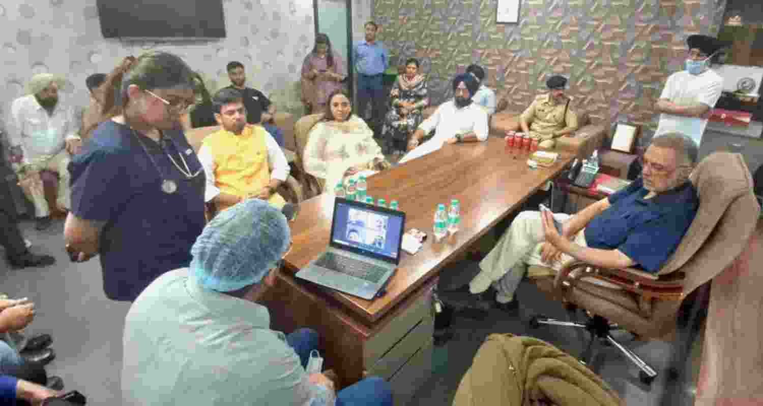 Punjab's Health and Family Welfare Minister, Dr. Balbir Singh, at the hospital where Dr. Anil Kamboj is admitted in Moga