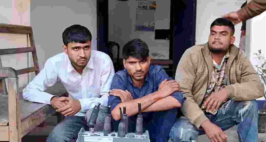 The accused, Shakir Khan (L), Nabed (C), and Mainur Ali (R), arrested by Assam Police in Bongaigaon for attempting to steal mobile tower equipment, are seen in police custody.