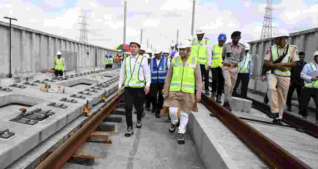 Railway Minister Ashwini Vaishnaw and Japan’s Transport Minister Hiromasa Nakano review construction work at Surat for India’s first bullet train corridor, the Mumbai–Ahmedabad high-speed rail project.