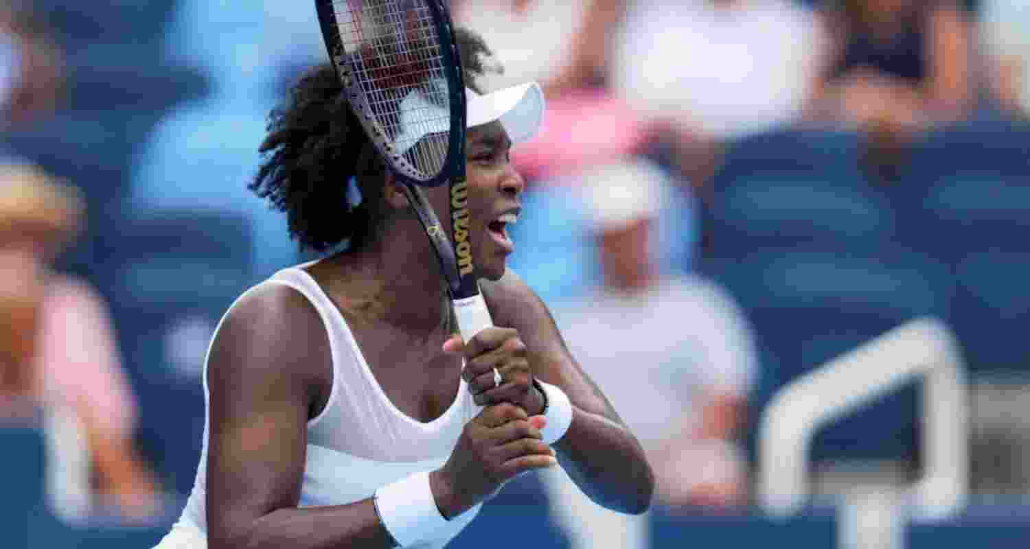 Venus Williams (USA) returns a shot against Jessica Bouzas Maneiro (ESP) during the Cincinnati Open at the Lindner Family Tennis Center.