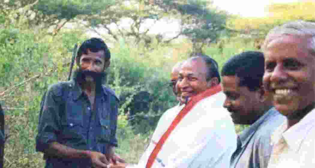 Forest brigand Veerappan seen with Kannada film icon Dr. Rajkumar during the latter’s 108-day captivity following his abduction from a farmhouse near Thalavadi in July 2000.