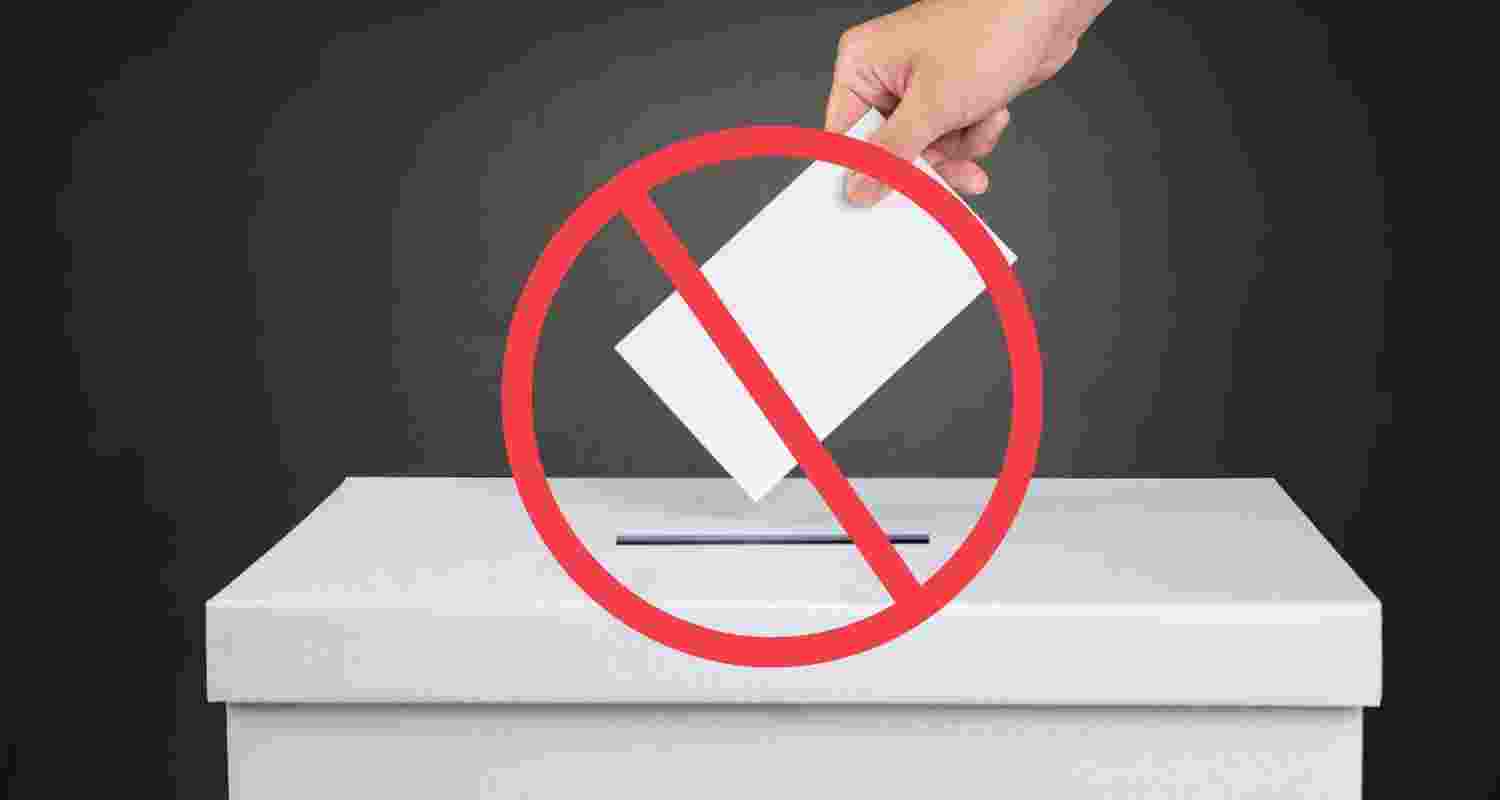 Image of person voting with abstain sign. Image of person voting with abstain sign.