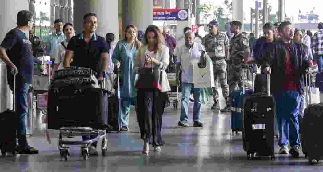 Indians who were stranded in West Asia due to flight disruptions amid the ongoing US-Israel-Iran conflict, upon their arrival at Chhatrapati Shivaji Maharaj International Airport, in Mumbai. 