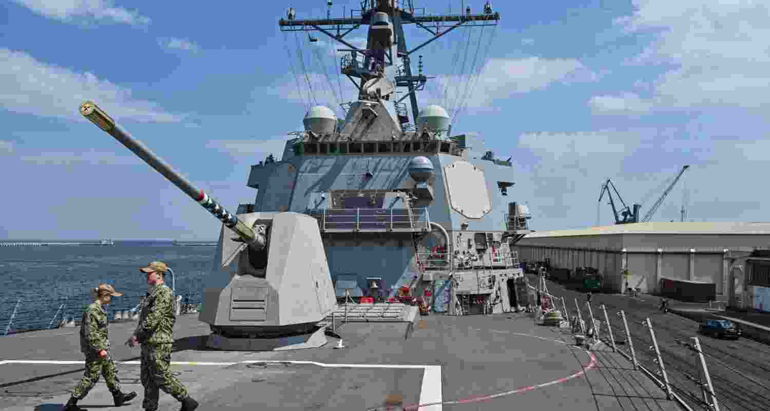 US navy soldiers on the deck of the USS Gravely.
