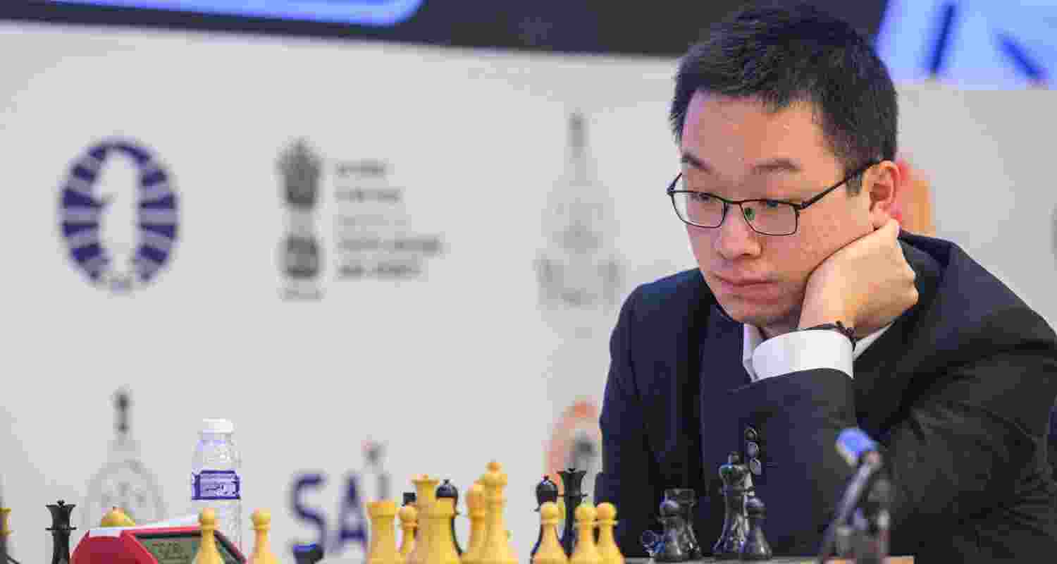 Chinese GM Wei Yi contemplating his next move against GM Javokhir Sindarov in the opening game of the FIDE World Cup final in Panaji on Monday.