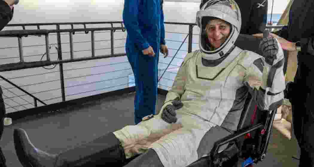 NASA astronaut Sunita Williams is assisted out of the SpaceX Dragon spacecraft aboard the SpaceX recovery vessel after the Crew-9 mission's successful splashdown.