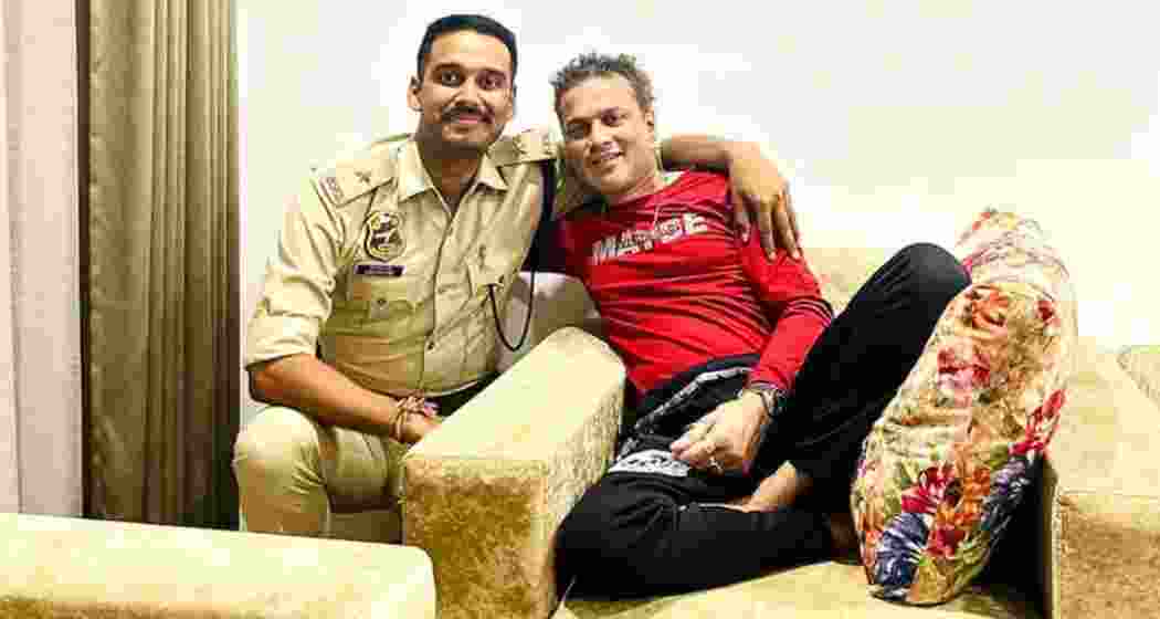 A file photo of Zubeen Garg with his cousin Sandipan Garg, an APS officer.