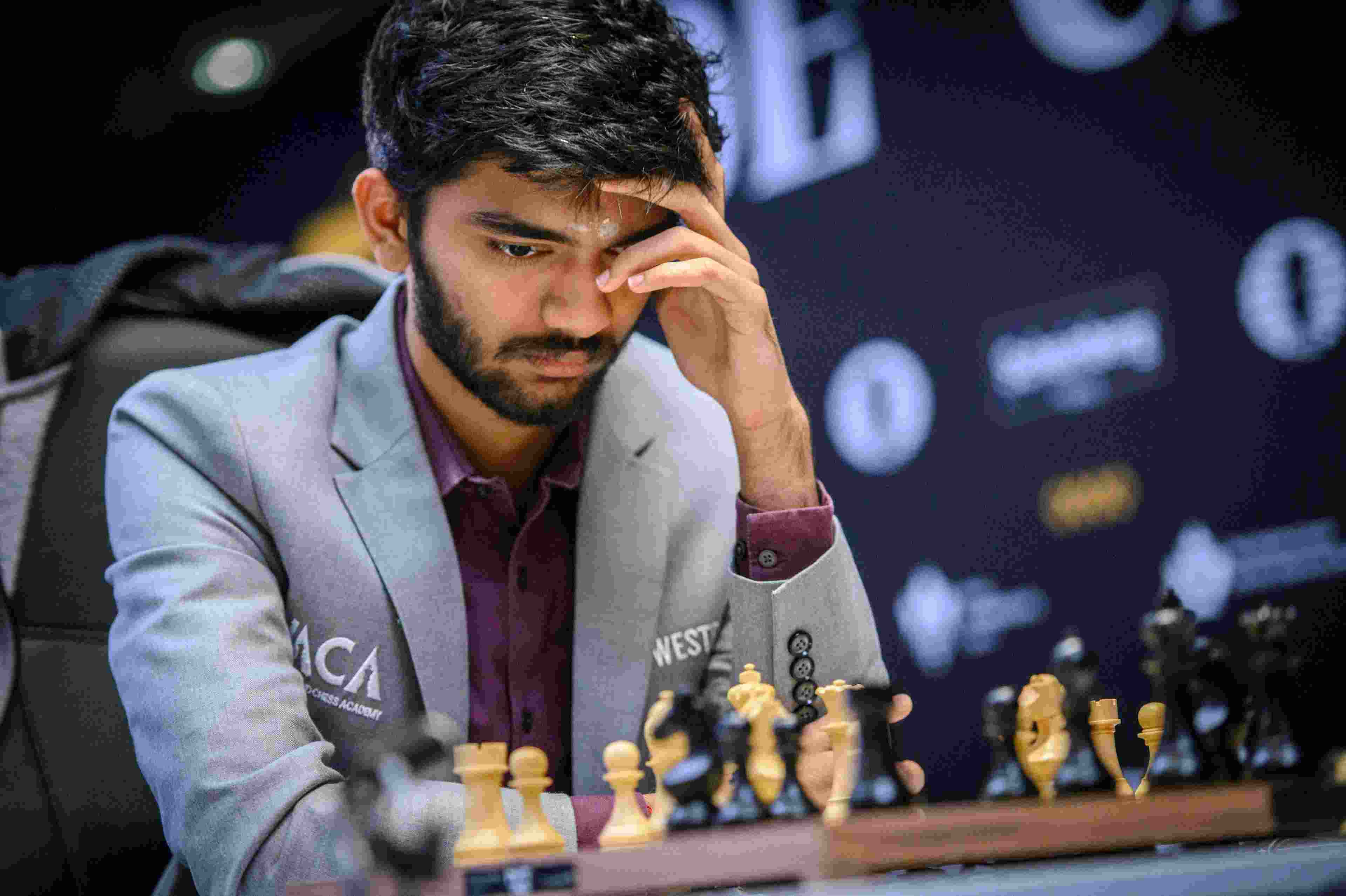 Grandmaster D Gukesh played out a creditable draw against top seed Fabiano Caruana but slipped a rung to the joint second position on a day when two other Indians endured frustrating losses in the Candidates Chess Tournament's 11th round Grandmaster D Gukesh played out a creditable draw against top seed Fabiano Caruana but slipped a rung to the joint second position on a day when two other Indians endured frustrating losses in the Candidates Chess Tournament's 11th round