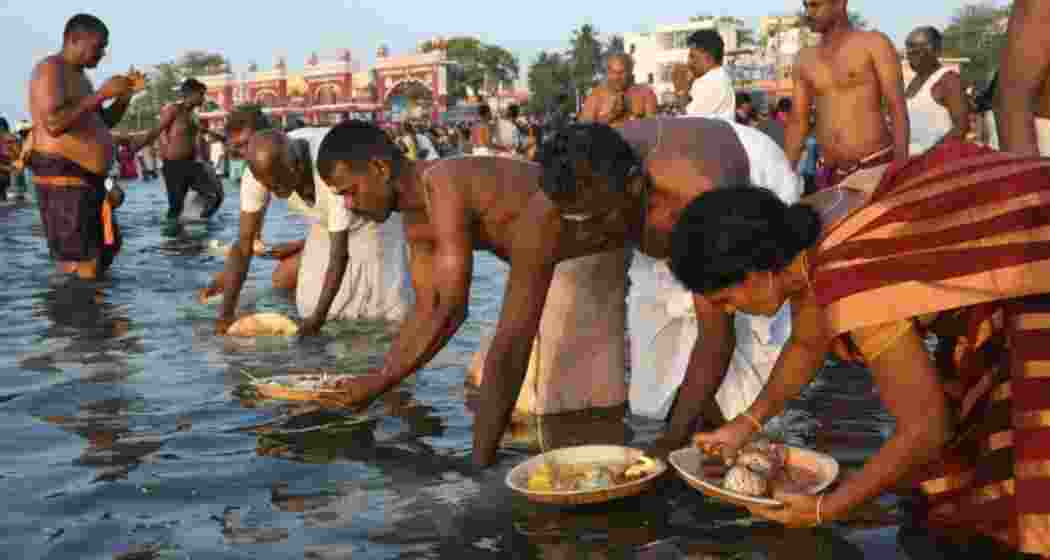 Devotees gather at the banks of the Kaveri River on Thursday seeking blessings and prosperity through sacred Tamil rituals. Devotees gather at the banks of the Kaveri River on Thursday seeking blessings and prosperity through sacred Tamil rituals.