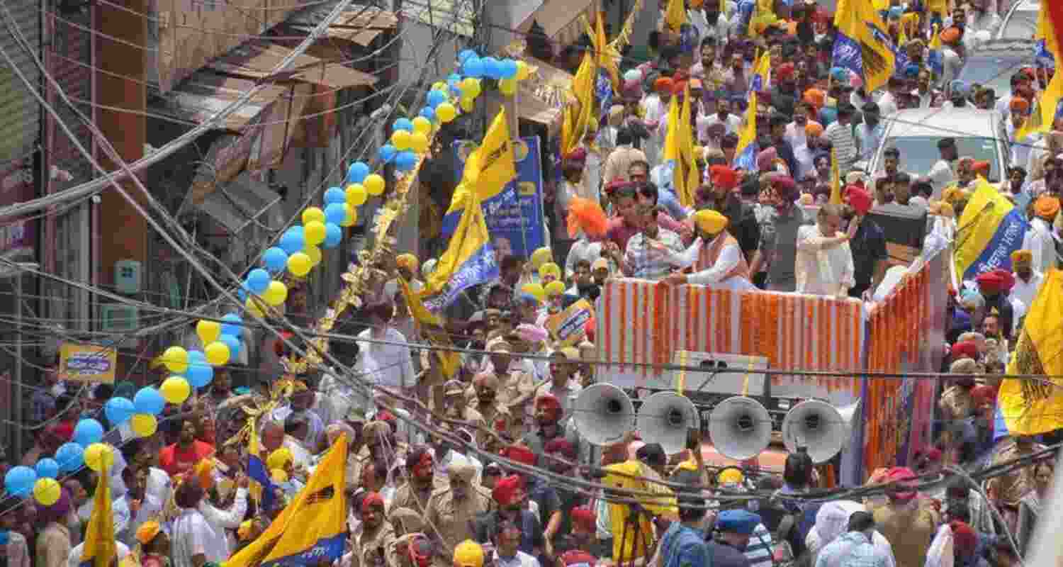 AAP holds roadshow prior to filing of nomination papers by Sanjeev Arora as candidate for the Ludhiana West constituency bypoll on Friday. AAP holds roadshow prior to filing of nomination papers by Sanjeev Arora as candidate for the Ludhiana West constituency bypoll on Friday.