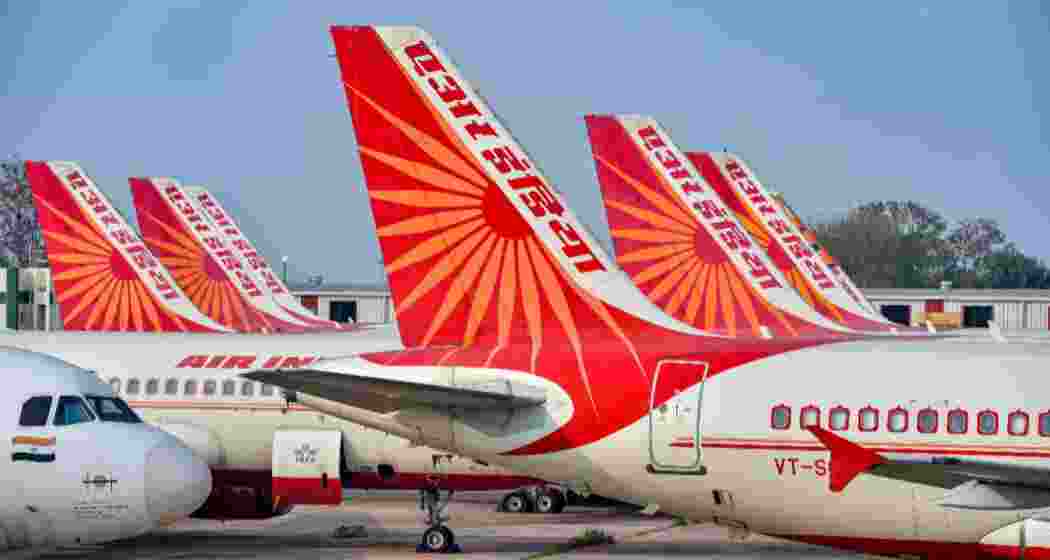 Air India fleet stationed at an airport. Air India fleet stationed at an airport.