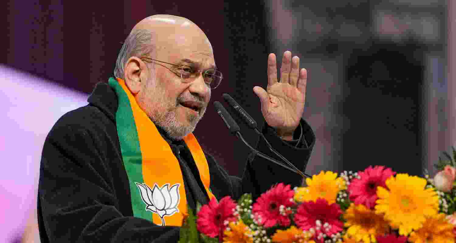 Union Home Minister Amit Shah and BJP leader Jay Panda at the 'Jhuggi Basti Pradhan Sammelan', in New Delhi, Saturday. Union Home Minister Amit Shah and BJP leader Jay Panda at the 'Jhuggi Basti Pradhan Sammelan', in New Delhi, Saturday.