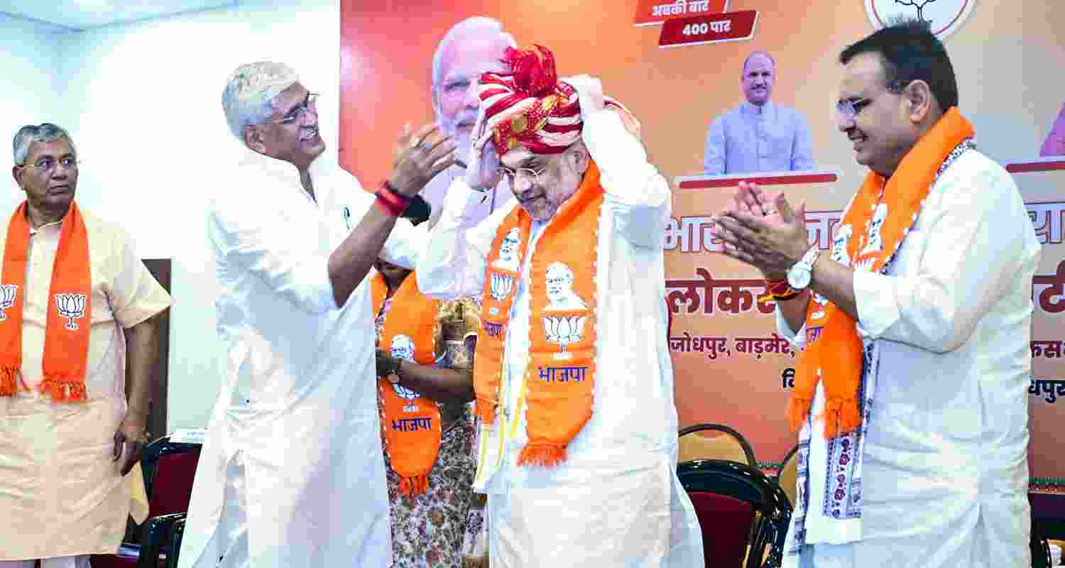 Amit Shah being felicitated at an event in Jodhpur. Amit Shah being felicitated at an event in Jodhpur.