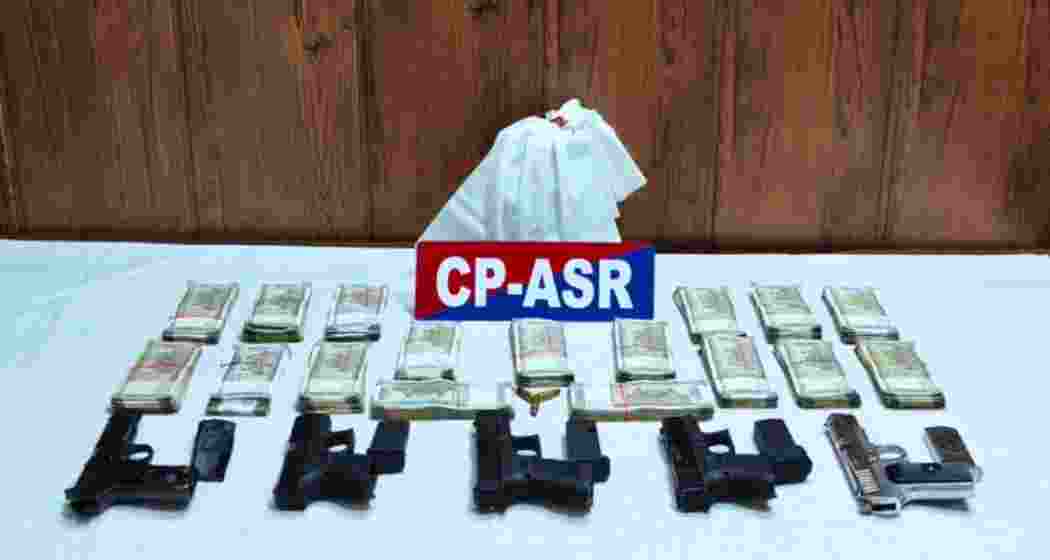 Weapons and hawala cash seized by Amritsar Police during a crackdown on an arms-narcotics module operated by Pakistani and Malaysian handlers. Weapons and hawala cash seized by Amritsar Police during a crackdown on an arms-narcotics module operated by Pakistani and Malaysian handlers.