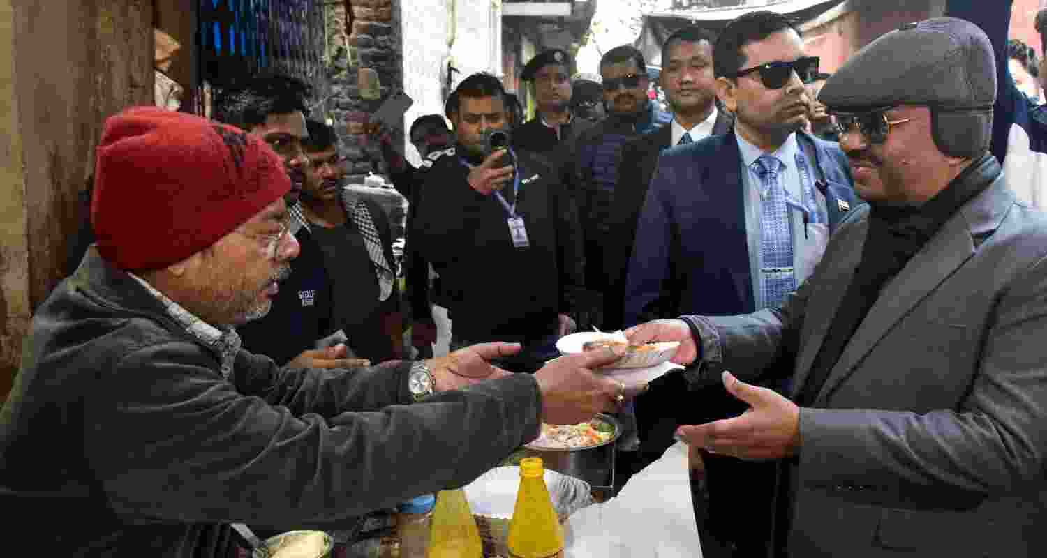 West Bengal Governor CV Ananda Bose interacts with food stall owners. West Bengal Governor CV Ananda Bose interacts with food stall owners.