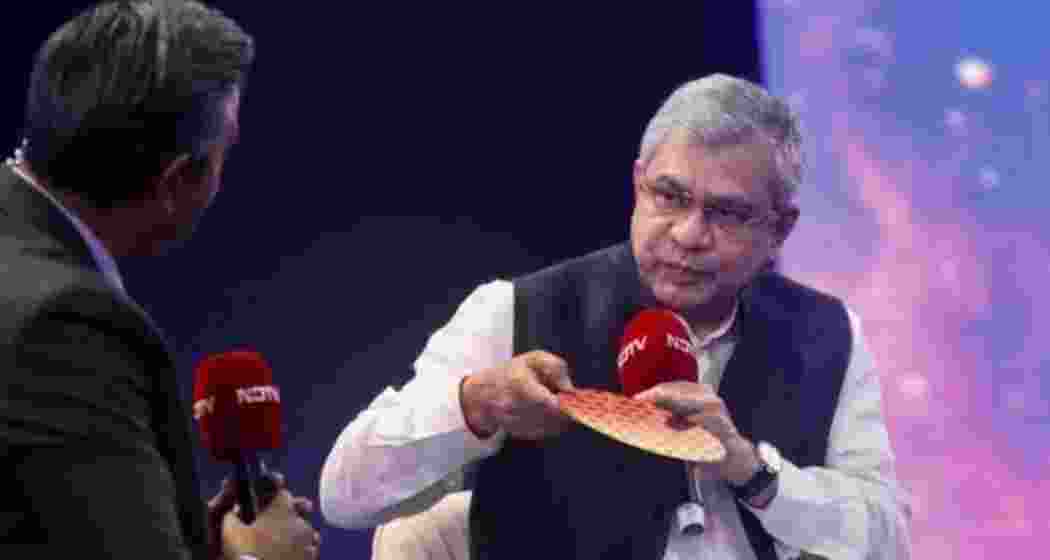 Union IT Minister Ashwini Vaishnaw displays a palm-sized 2nm semiconductor wafer. Union IT Minister Ashwini Vaishnaw displays a palm-sized 2nm semiconductor wafer.