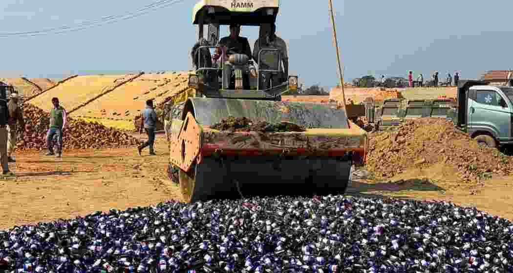 Assam Rifles and DRI officials destroy an illegal consignment seized during anti-drug operations in Cachar and Siaha districts. Assam Rifles and DRI officials destroy an illegal consignment seized during anti-drug operations in Cachar and Siaha districts.