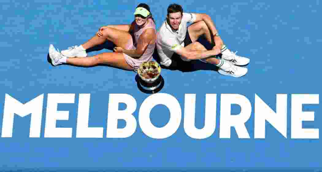 Olivia Gadecki and John Peers celebrate with the trophy after defeating Kristina Mladenovic and Manuel Guinard to win the Australian Open mixed doubles title at Rod Laver Arena. Olivia Gadecki and John Peers celebrate with the trophy after defeating Kristina Mladenovic and Manuel Guinard to win the Australian Open mixed doubles title at Rod Laver Arena.