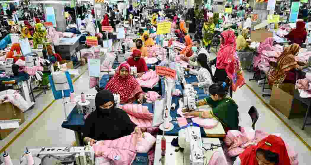 Workers in Bangladesh’s textile industry performing their daily chores. Workers in Bangladesh’s textile industry performing their daily chores.