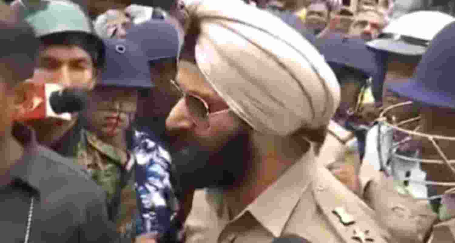 BJP supporters clash with police in Sandeshkhali, amid allegations of religious slurs being hurled at a Sikh officer. BJP supporters clash with police in Sandeshkhali, amid allegations of religious slurs being hurled at a Sikh officer.