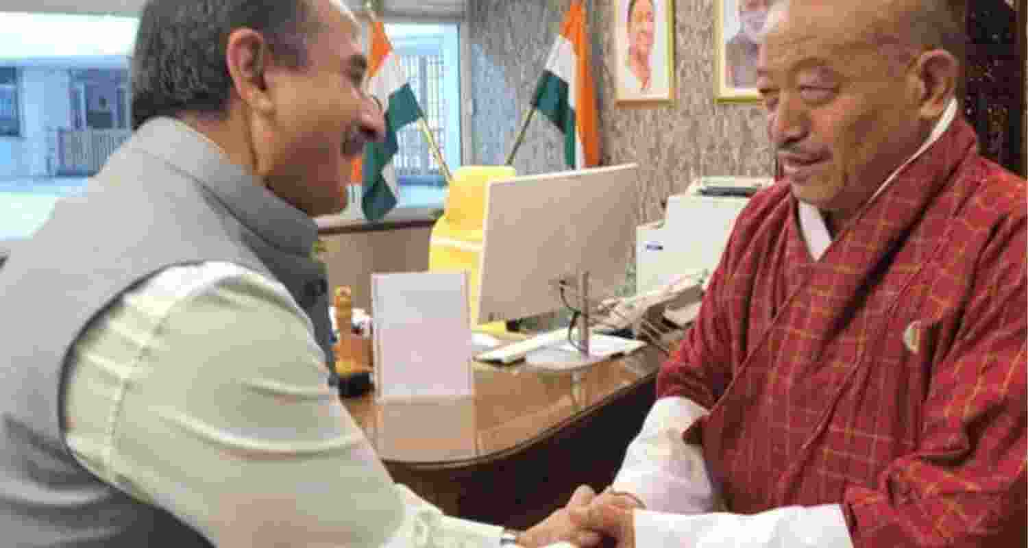 MoS Environment Kirti Vardhan Singh and Bhutanese Minister for Energy and Resources Gem Tshering. MoS Environment Kirti Vardhan Singh and Bhutanese Minister for Energy and Resources Gem Tshering.