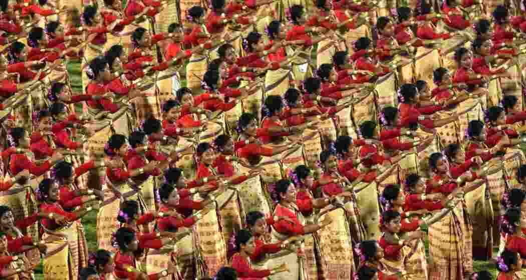 Bihu dancers in their traditional attire at the Sarusajai Stadium in Guwahati. Bihu dancers in their traditional attire at the Sarusajai Stadium in Guwahati.
