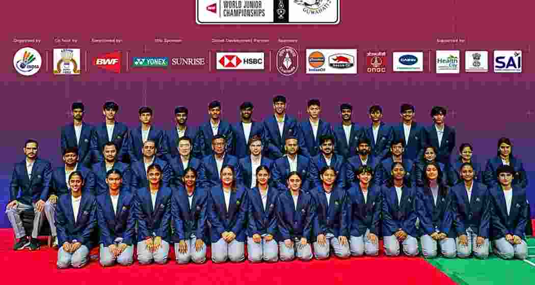 Indian shuttlers, along with officials and team nembers, pose for a photograph. Indian shuttlers, along with officials and team nembers, pose for a photograph.