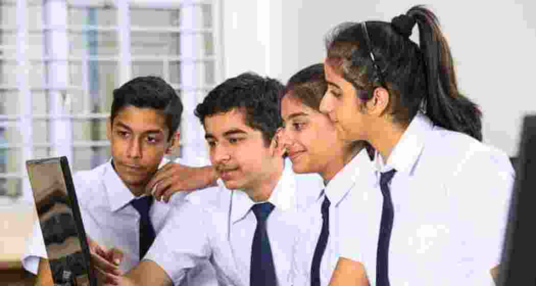 Students work on a PC during a classroom session. Students work on a PC during a classroom session.