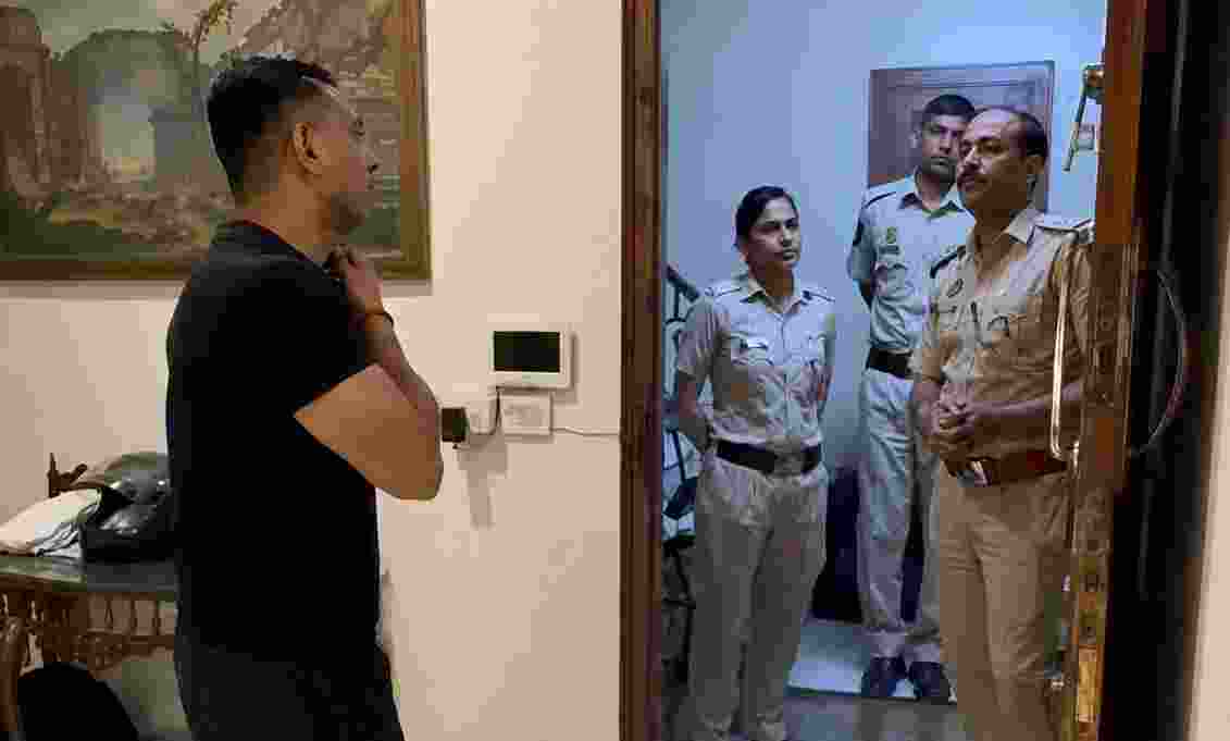 Activist Tehseen Poonawalla speaks to Delhi Police personnel at his residence. Activist Tehseen Poonawalla speaks to Delhi Police personnel at his residence.